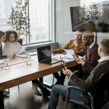 front-view-people-having-meeting-office